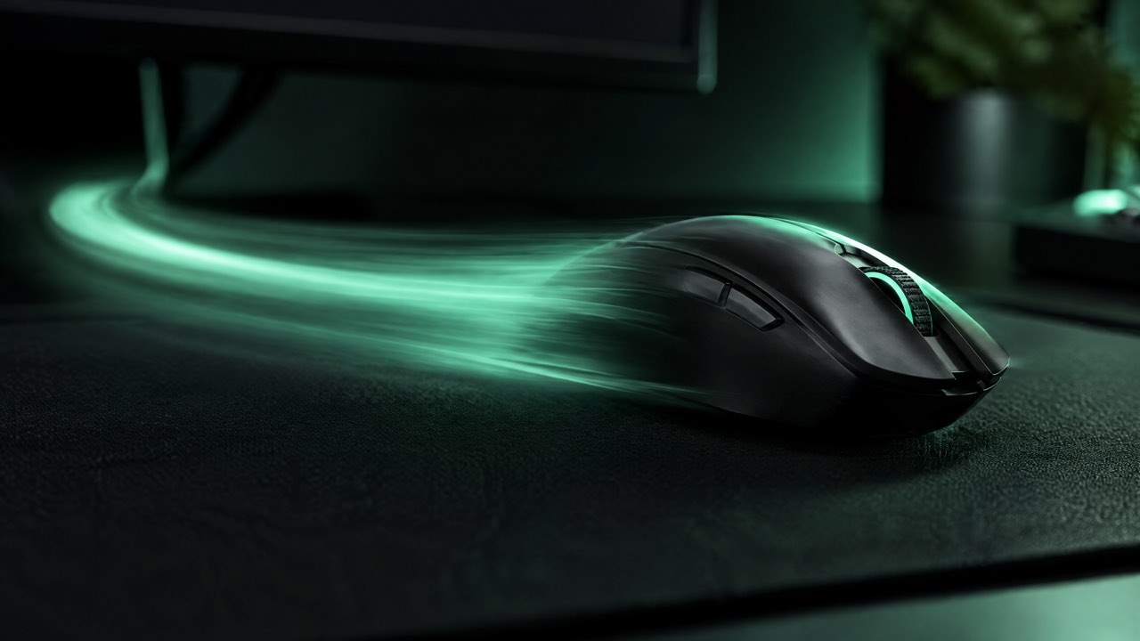 A gaming mouse leaving a green light trail as it flicks across a mousepad